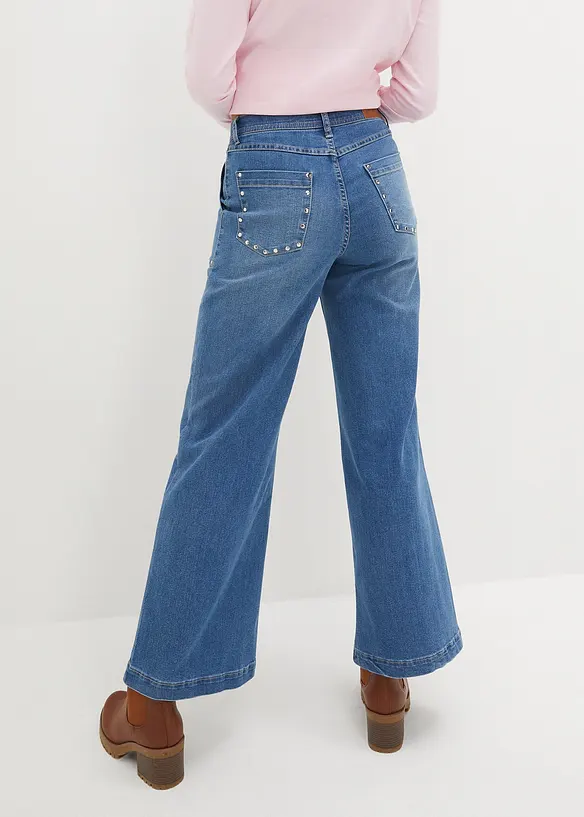 Jean taille moyenne, jambe évasée, avec rivets, bonprix