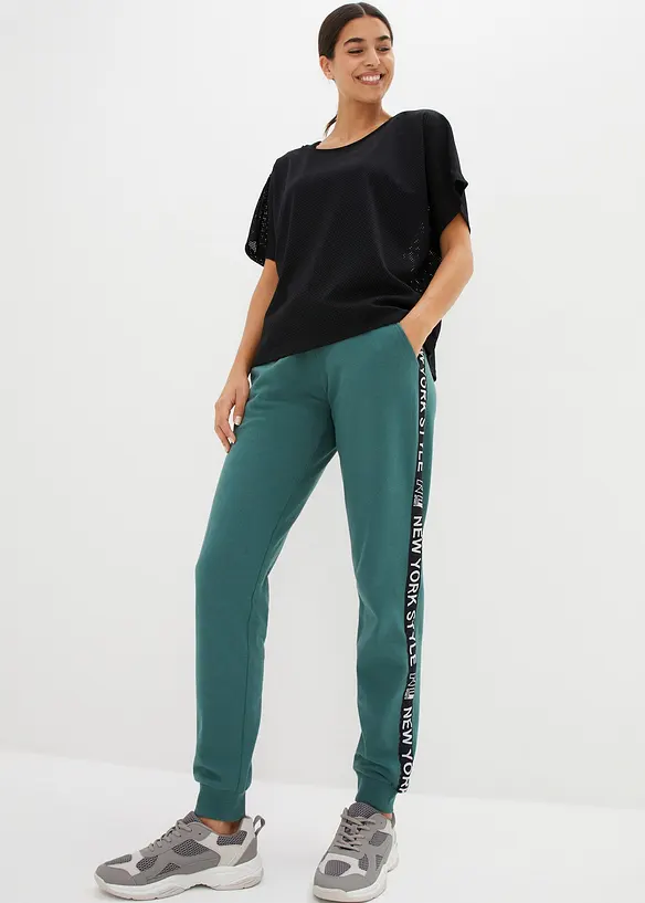 Pantalon en molleton avec lien à nouer et message imprimé, bonprix
