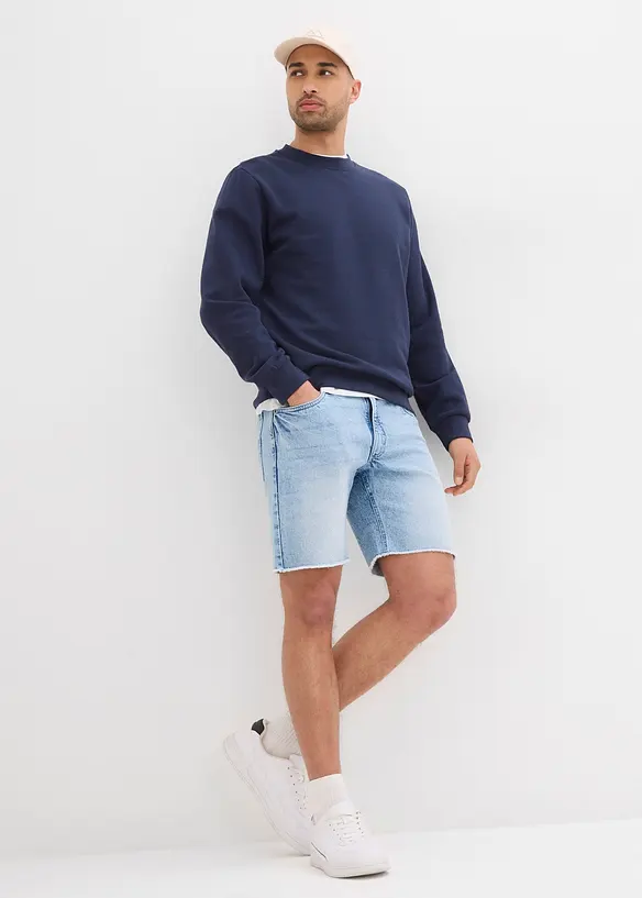 Bermuda en jean extensible à finitions effilochées, loose, bonprix