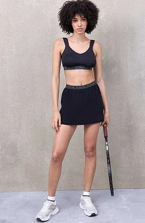 Femme - Jupette de sport ultra-légère avec short intégré - noir