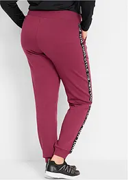 Pantalon en molleton avec lien à nouer et message imprimé, bonprix