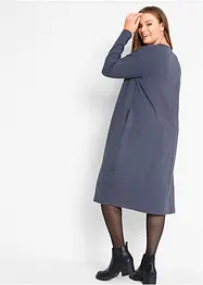 Robe de forme ovoïde en jersey de coton avec poches, manches longues et longueur genou, bonprix