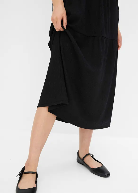 Robe en jersey à volants et patte de boutonnage décorative, bonprix