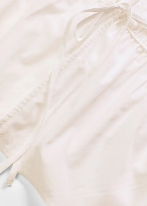 Blouse sans manches à volants et nouettes, bonprix