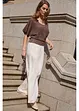 Pantalon large et fluide à taille élastiquée, bonprix